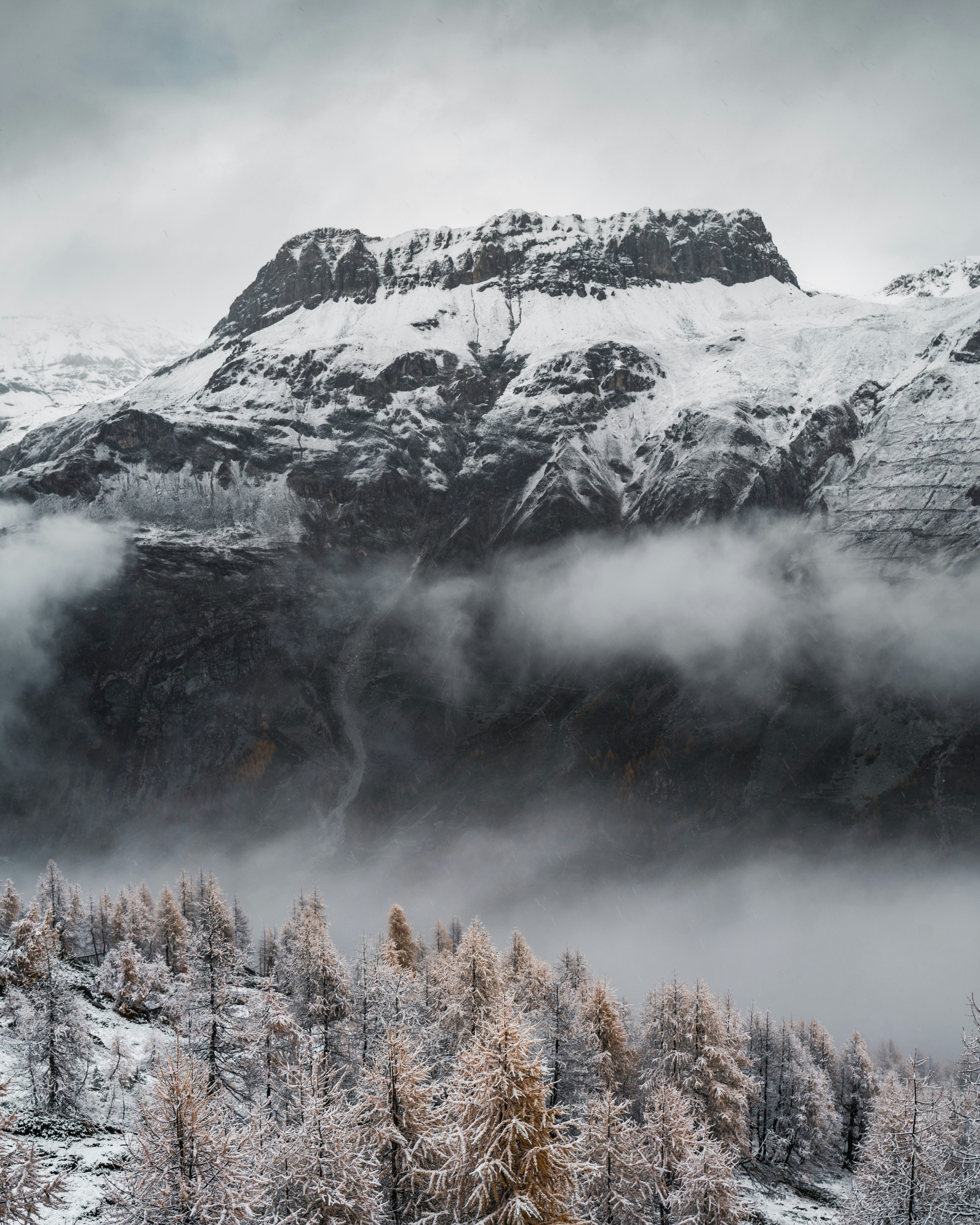 grayscale photography of mountain alps during daytime
